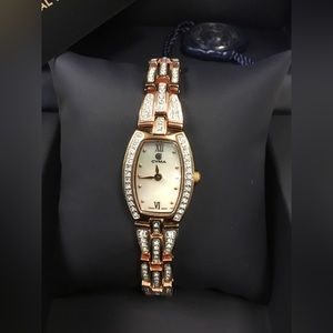 CYMA 18K gold sapphire crystal bracelet watch